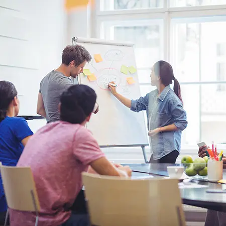 Illustration of a mother asking Ankata tutoring a question